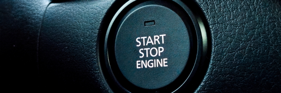 Image of push start button on a vehicle